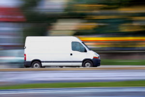 Blur white van, panning and move Expedited Freight